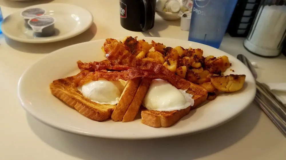 Two Poached Eggs on White Toast